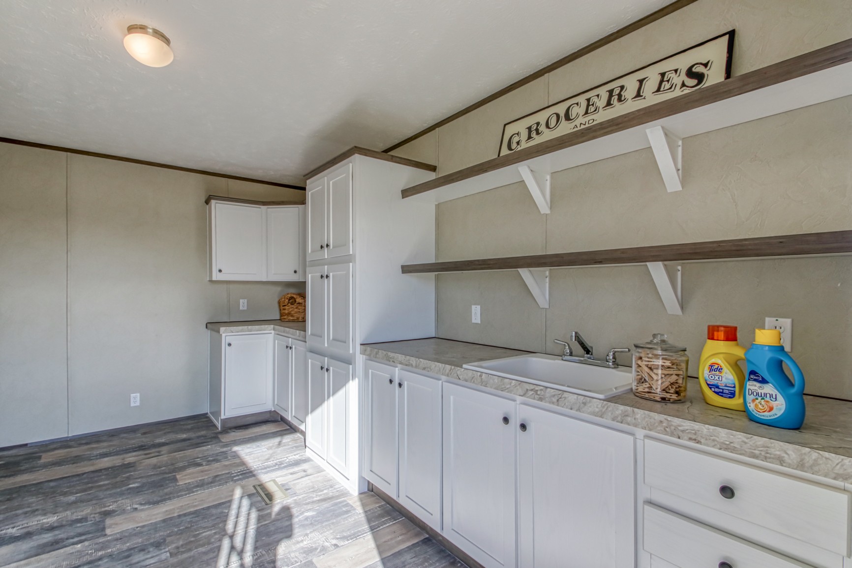 1838 Austin Road Lafayette, TN 37083 - Photo 17 of 41 a kitchen with a sink and cabinets