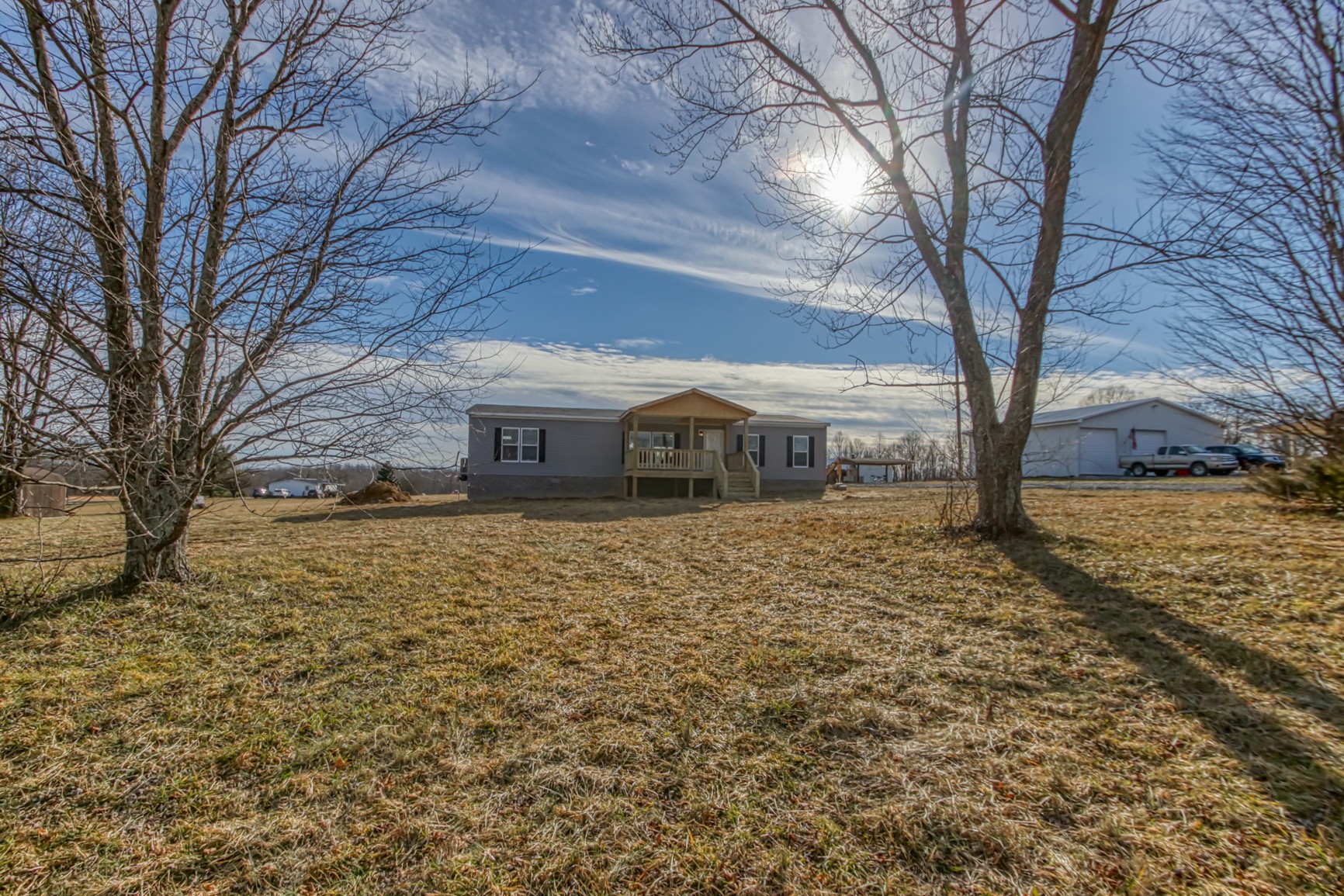 1838 Austin Road Lafayette, TN 37083 - Photo 24 of 41 a front view of a house with a yard