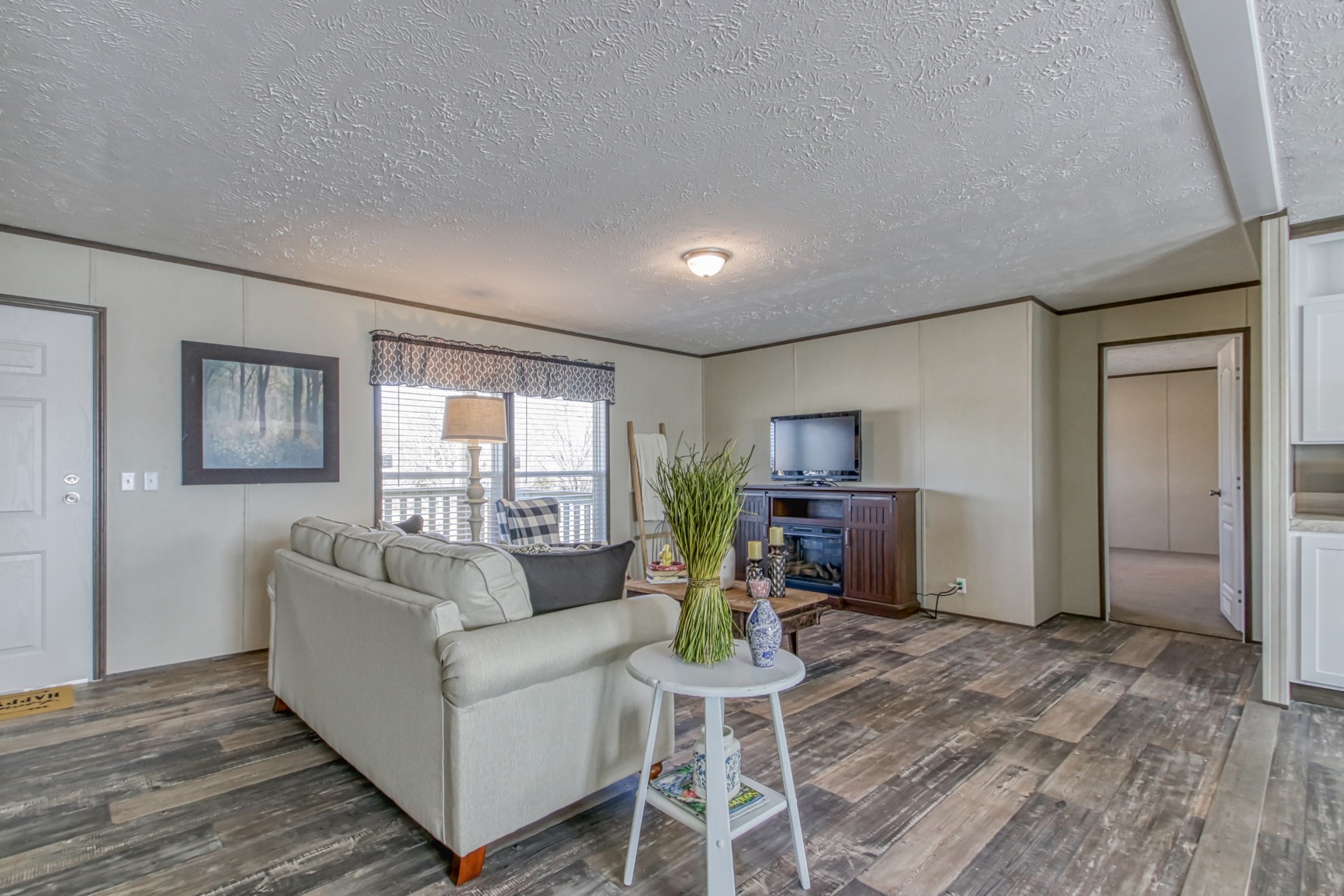 1838 Austin Road Lafayette, TN 37083 - Photo 4 of 41 a living room with furniture and a wooden floor