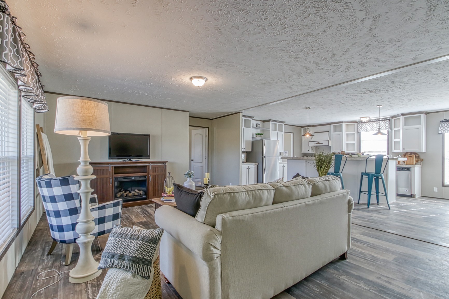 1838 Austin Road Lafayette, TN 37083 - Photo 41 of 41 a living room with furniture a flat screen tv and a fireplace