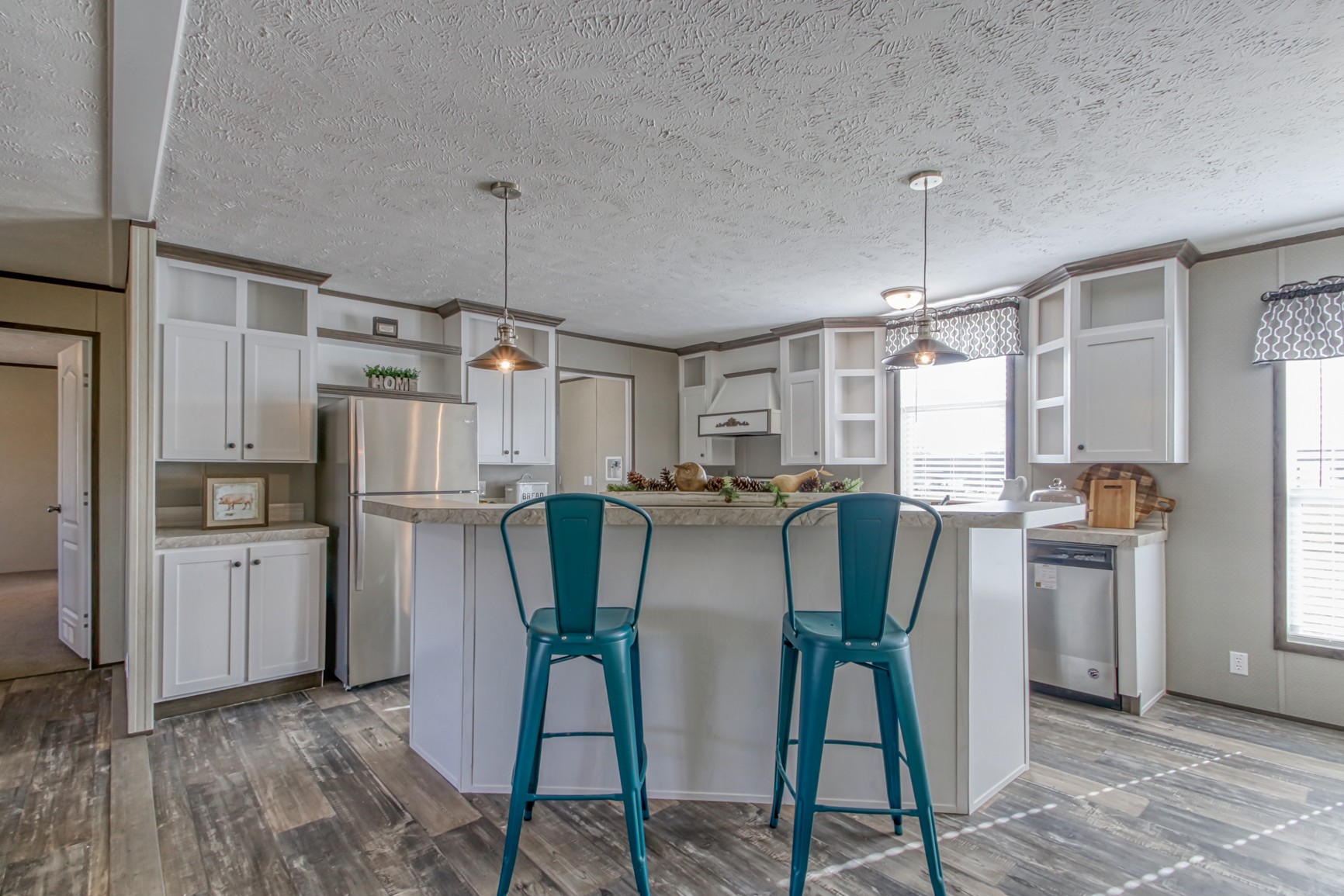 1838 Austin Road Lafayette, TN 37083 - Photo 10 of 41 a kitchen with refrigerator and wooden floor