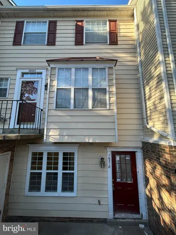 a building view with a window and balcony