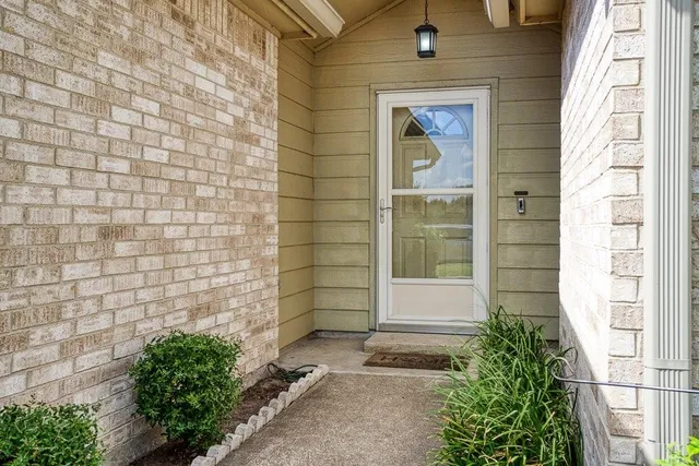 a house with trees in front of it