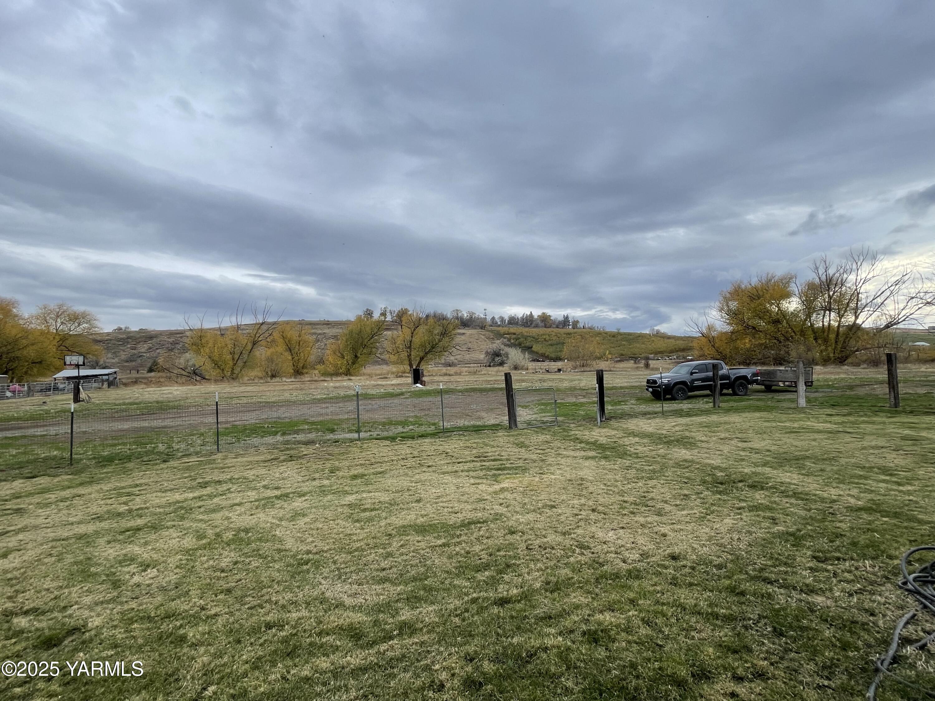 13010 Wide Hollow Road Yakima, WA 98908 - Photo 19 of 19 a view of a field with an trees