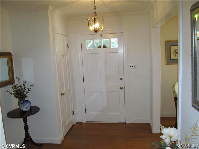 2710 Salisbury Road Midlothian, VA 23113 - Photo 2 of 12 a view of a hallway with wooden floor