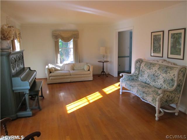 2710 Salisbury Road Midlothian, VA 23113 - Photo 3 of 12 a living room with furniture and a couch