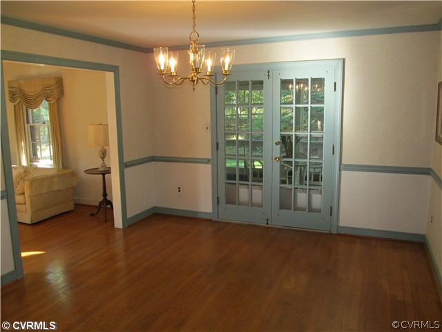 2710 Salisbury Road Midlothian, VA 23113 - Photo 4 of 12 an empty room with windows and entrance
