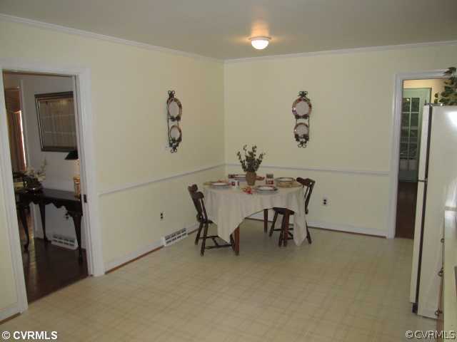 2710 Salisbury Road Midlothian, VA 23113 - Photo 6 of 12 a view of a dining room with furniture