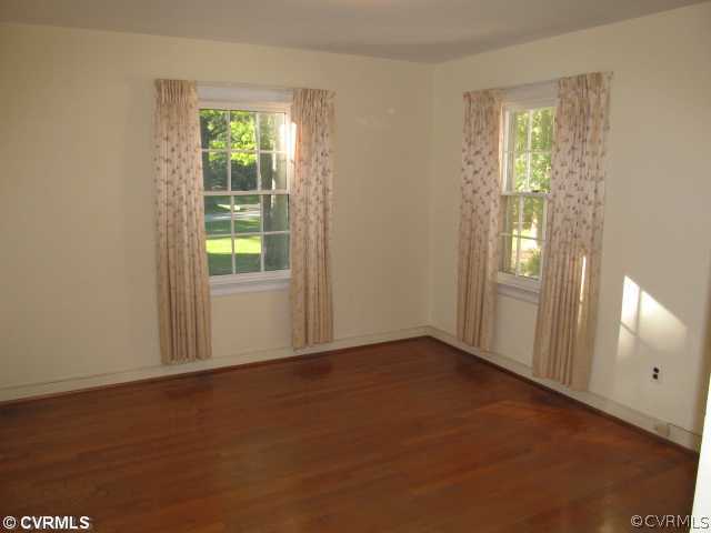 2710 Salisbury Road Midlothian, VA 23113 - Photo 9 of 12 an empty room with windows