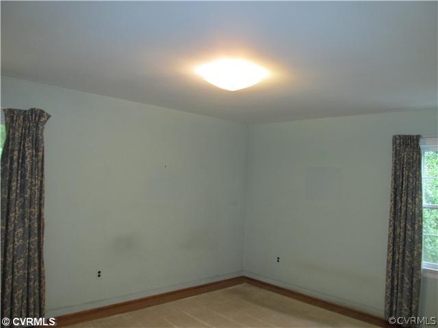 2710 Salisbury Road Midlothian, VA 23113 - Photo 10 of 12 a view of wooden floor and windows in a room