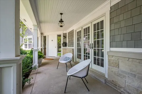 a outdoor space with patio furniture and potted plants