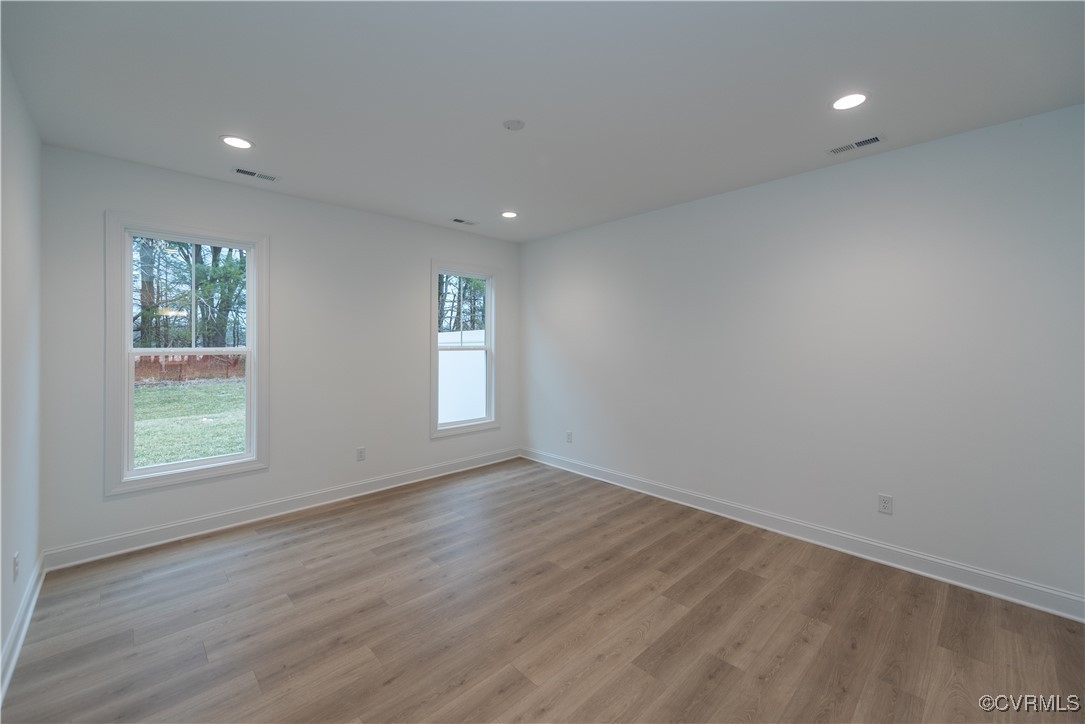 0 Hope Farm Lane Mechanicsville, VA 23111 - Photo 13 of 15 an empty room with wooden floor and windows