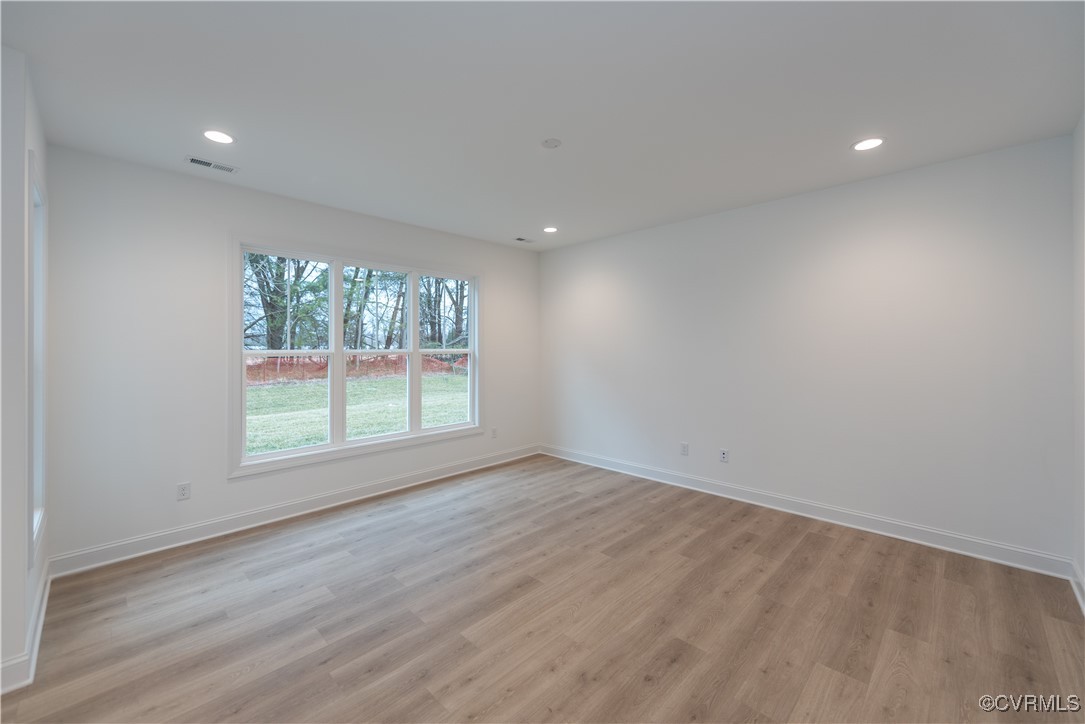 0 Hope Farm Lane Mechanicsville, VA 23111 - Photo 9 of 15 an empty room with wooden floor and windows