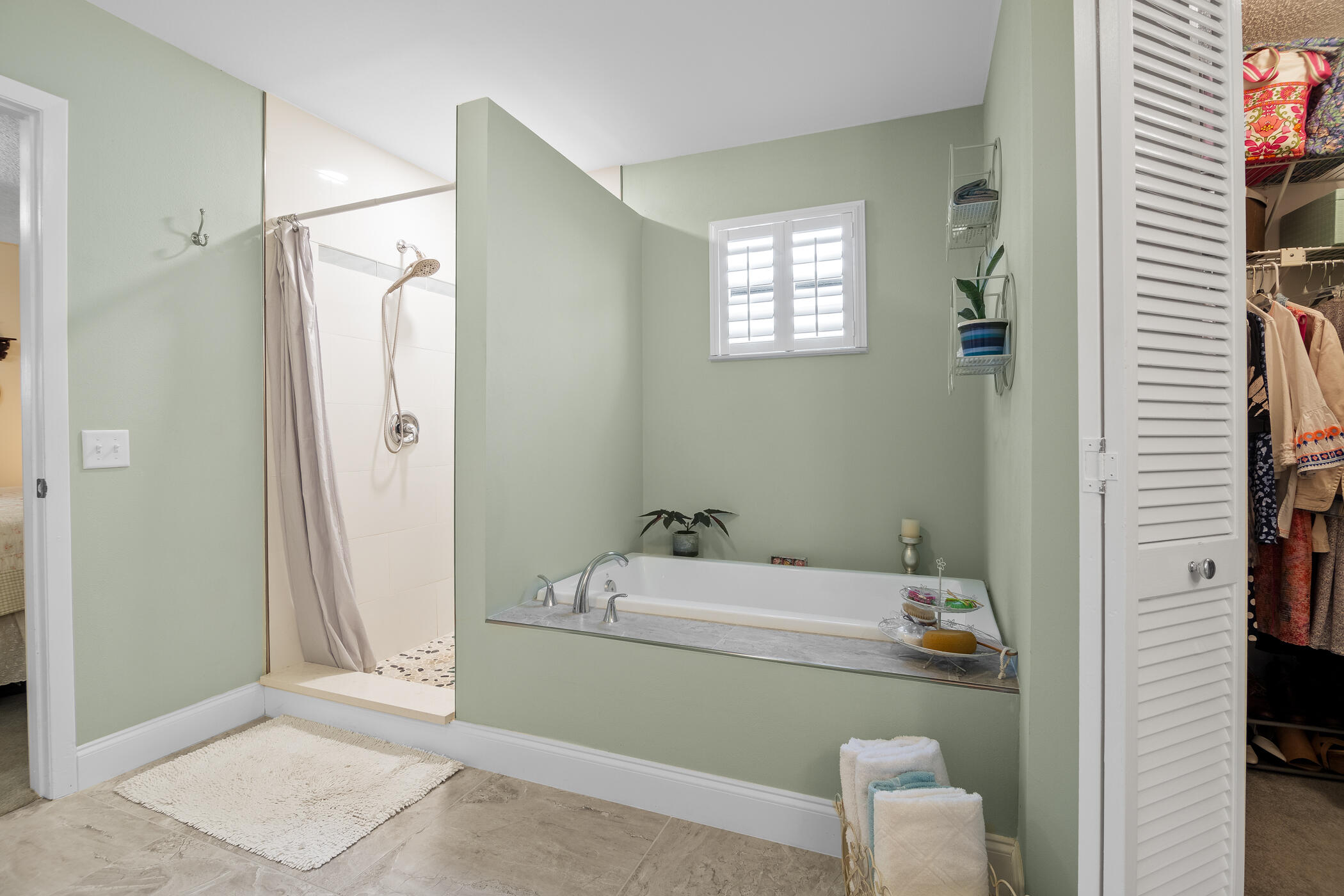 849 Gardener Road Rockledge, FL 32955 - Photo 12 of 31 a bathroom with a sink toilet and shower