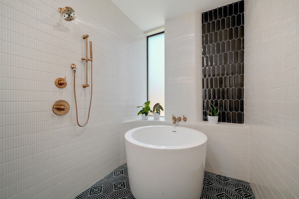 7809 Woodrow Avenue Austin, TX 78757 - Photo 18 of 40 a bathroom with a shower