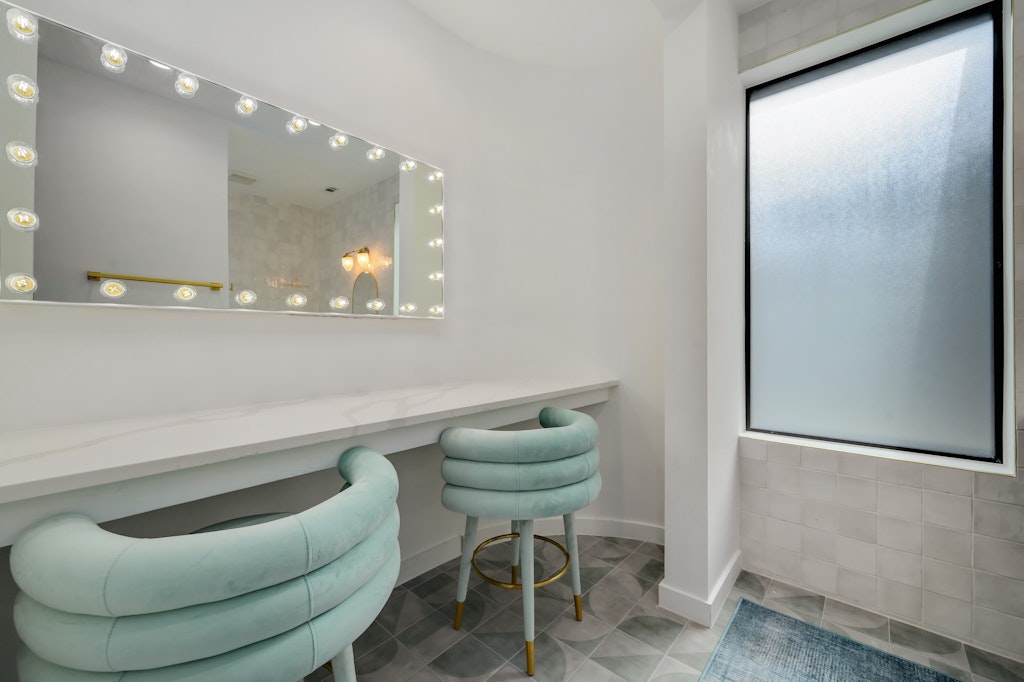 7809 Woodrow Avenue Austin, TX 78757 - Photo 24 of 40 a bathroom with a sink and a mirror