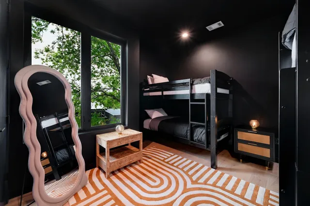 a view of a house with swimming pool and a yard