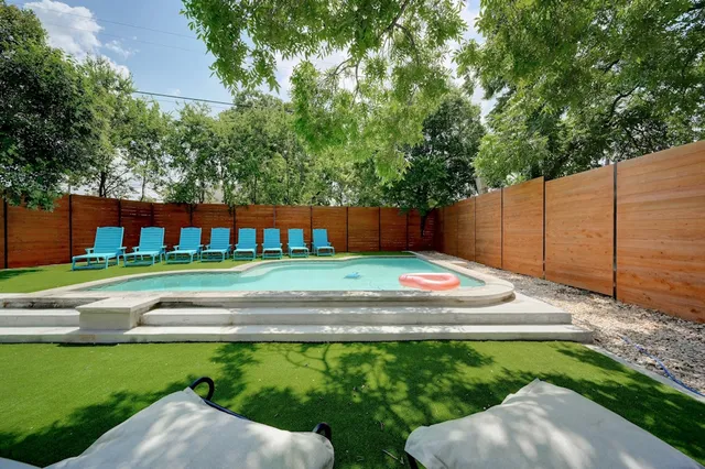 a view of a backyard of a house