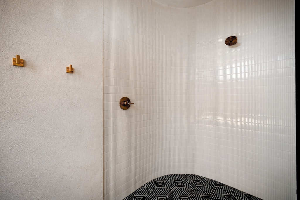 7809 Woodrow Avenue Austin, TX 78757 - Photo 36 of 40 a bathroom with a shower