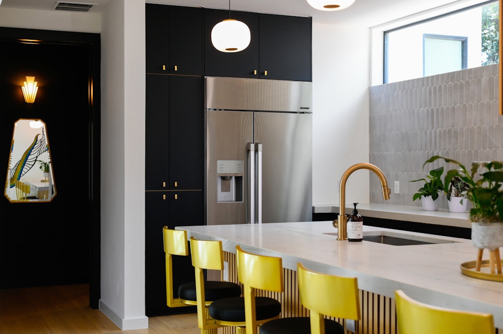 7809 Woodrow Avenue Austin, TX 78757 - Photo 8 of 40 a kitchen with a refrigerator and a sink