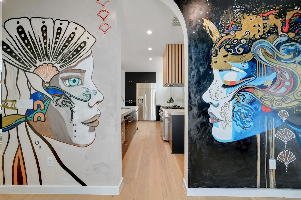 7809 Woodrow Avenue Austin, TX 78757 - Photo 9 of 40 a view of water heater room with furniture and a sign