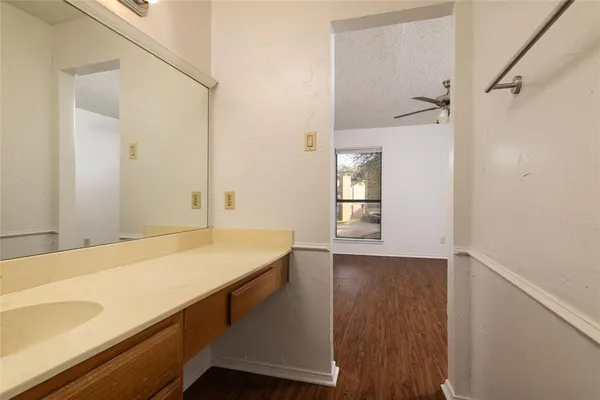 a bathroom with a sink and a bathtub