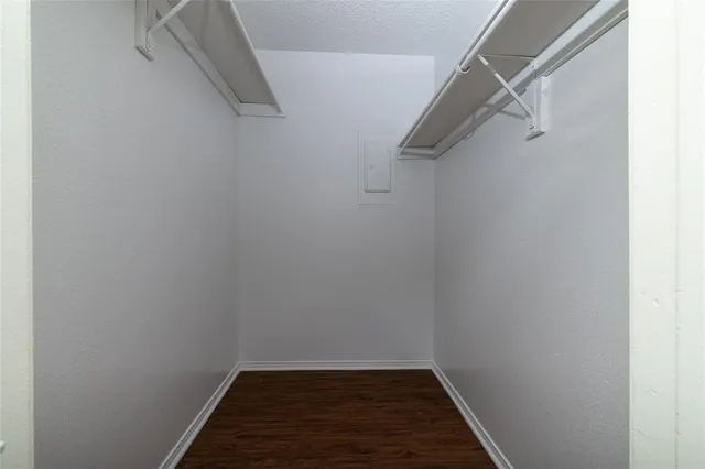 a view of a room with racks on the wall
