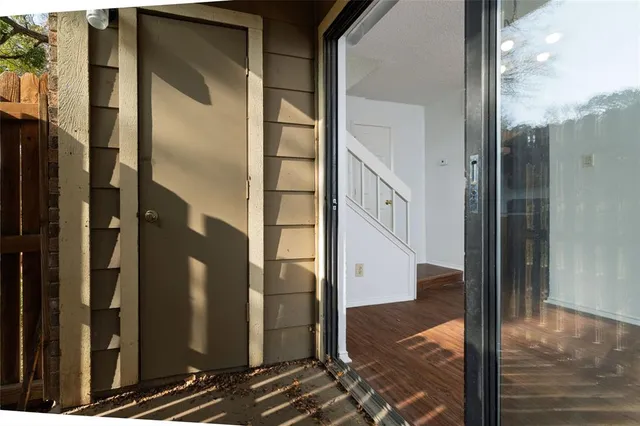 a view of a bathroom from a hallway