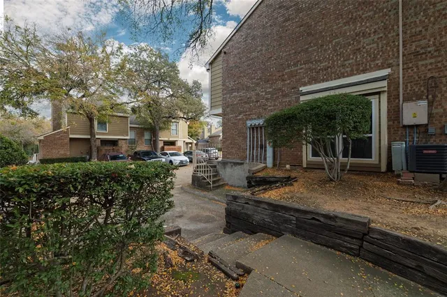 a view of a house with backyard porch and sitting area