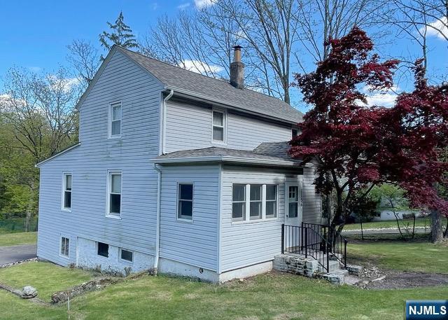 1156 High Mountain Road North Haledon, NJ 07508 - Photo 1 of 14 a view of a house with a yard