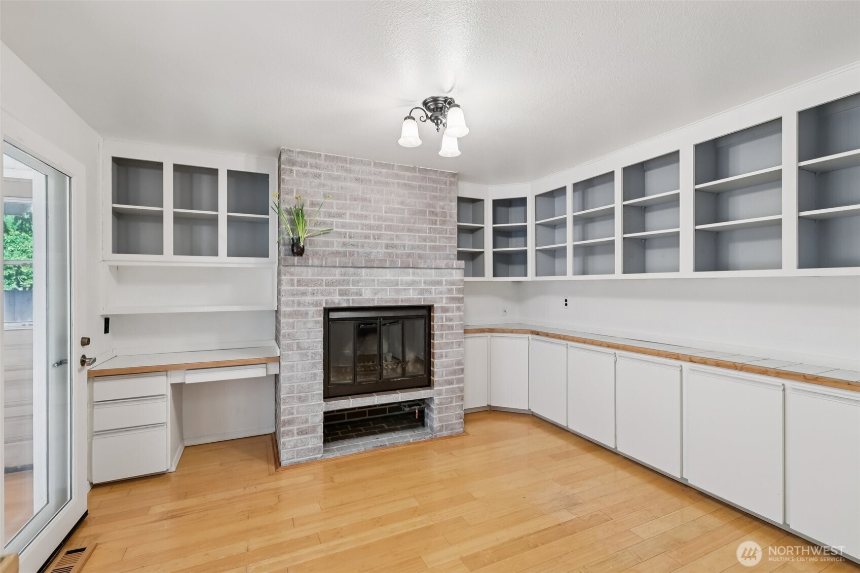 32229 2nd Avenue Southwest Federal Way, WA 98023 - Photo 12 of 40 a view of an empty room with a fireplace and a window