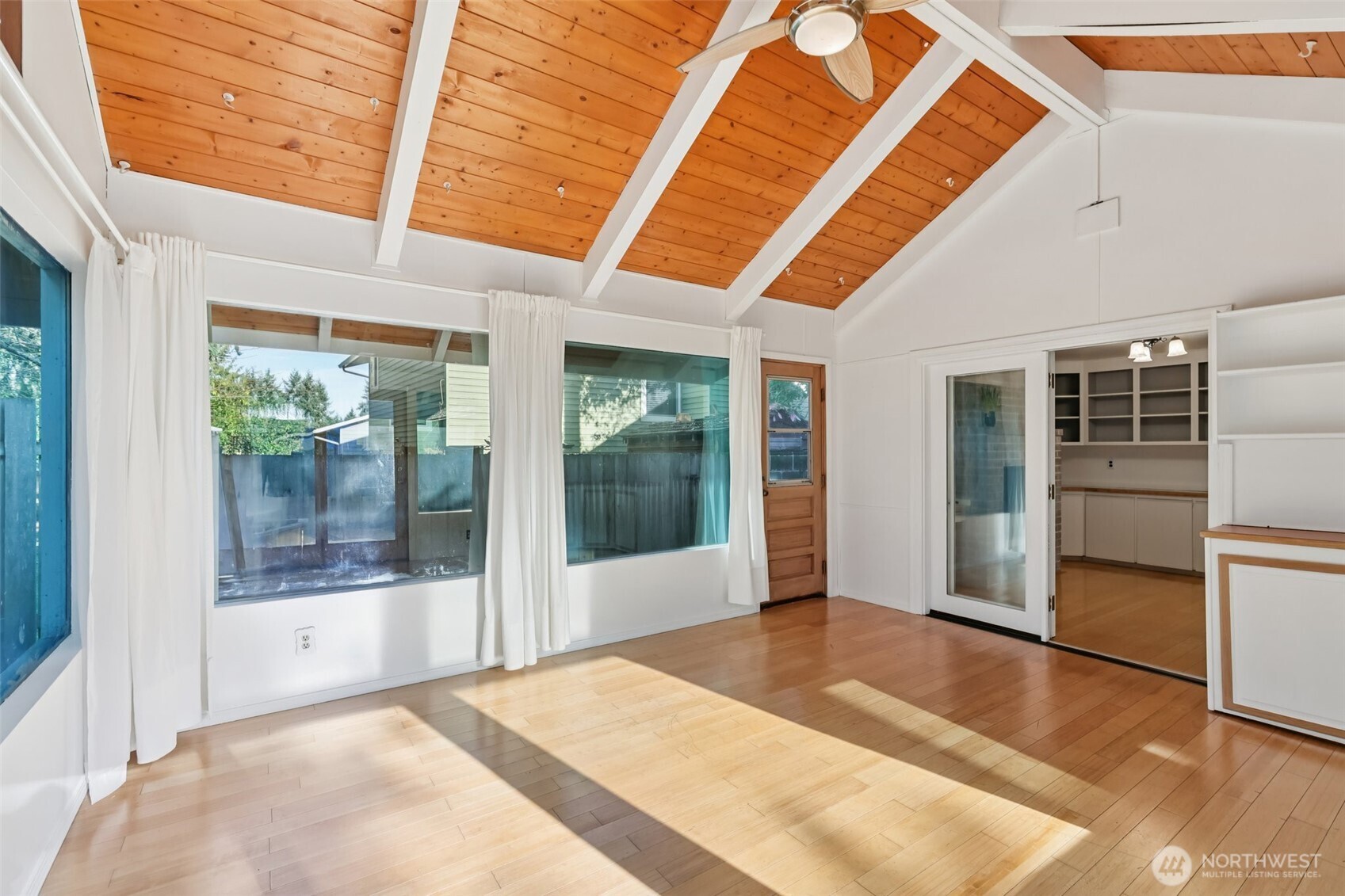32229 2nd Avenue Southwest Federal Way, WA 98023 - Photo 14 of 40 a view of a room with wooden floor and windows