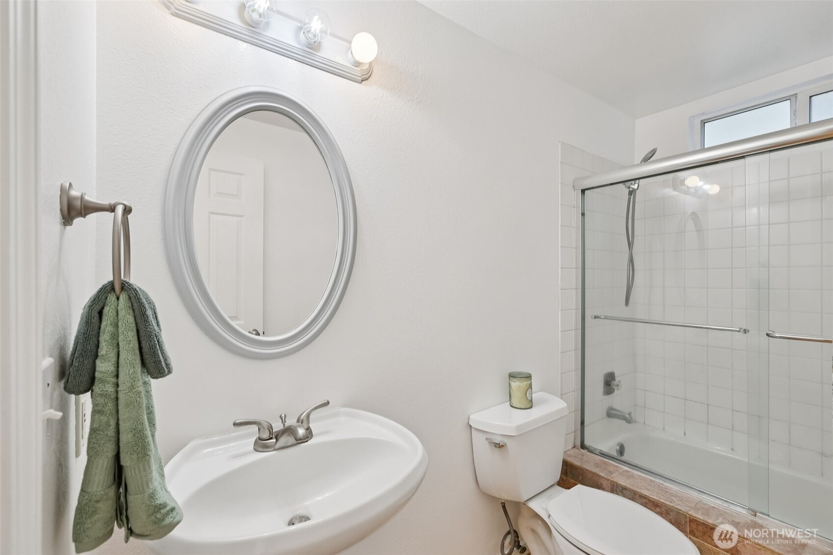 32229 2nd Avenue Southwest Federal Way, WA 98023 - Photo 20 of 40 a bathroom with a sink a toilet and a mirror