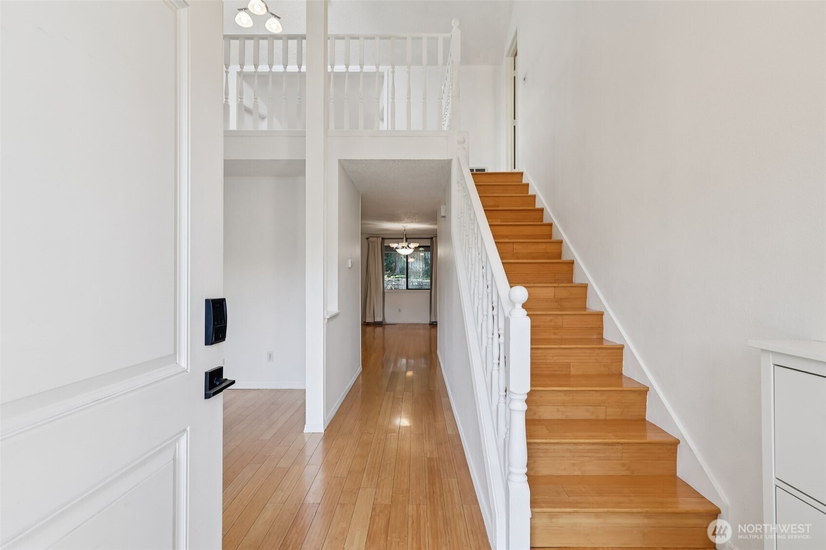 32229 2nd Avenue Southwest Federal Way, WA 98023 - Photo 3 of 40 a view of a hallway with wooden floor and staircase