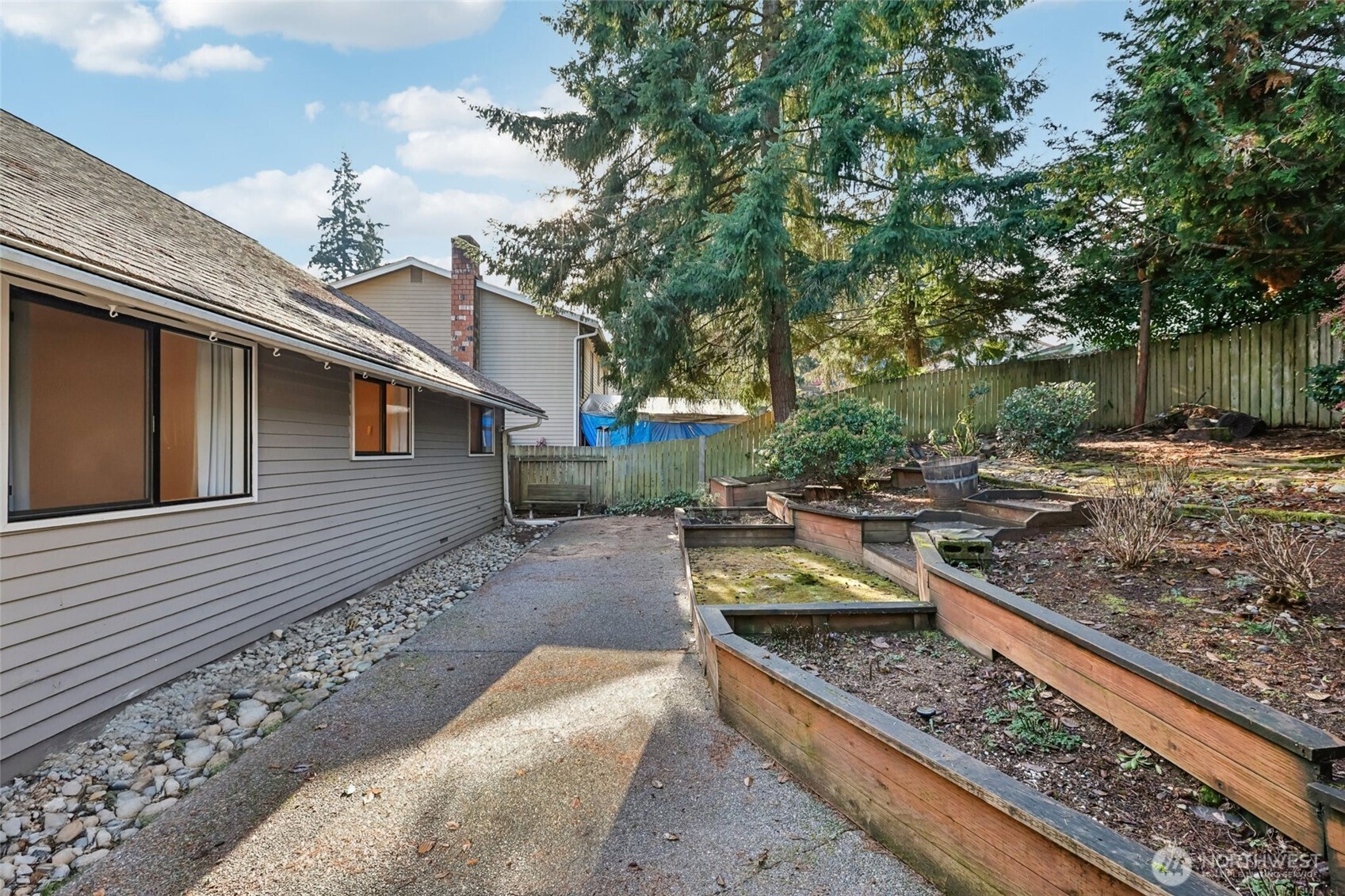 32229 2nd Avenue Southwest Federal Way, WA 98023 - Photo 34 of 40 a view of a yard with chairs and fire pit