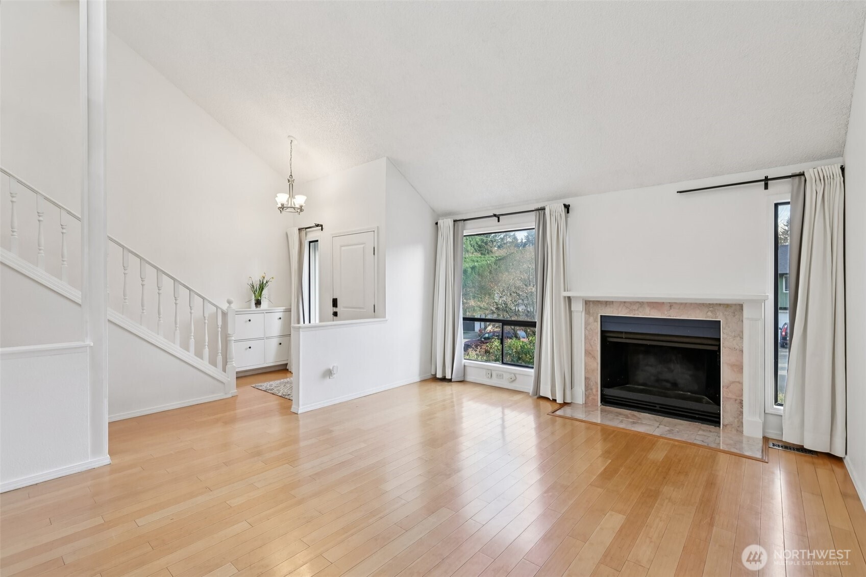 32229 2nd Avenue Southwest Federal Way, WA 98023 - Photo 5 of 40 a view of an empty room with wooden floor fireplace and a window