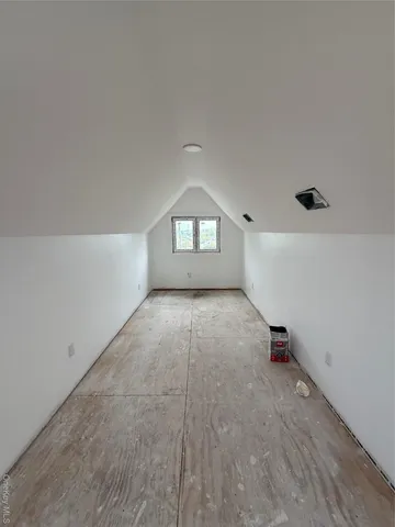 a picture of a bathroom with a shower