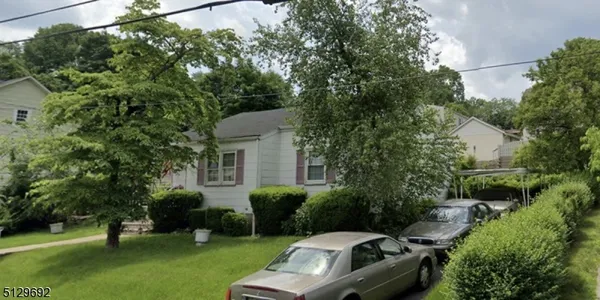 an outdoor view of garden with patio