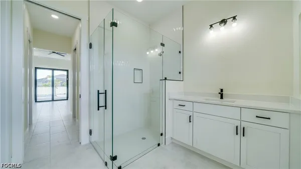 a bathroom with a bathtub and a sink