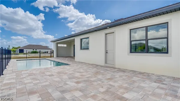a view of a house with entertaining space