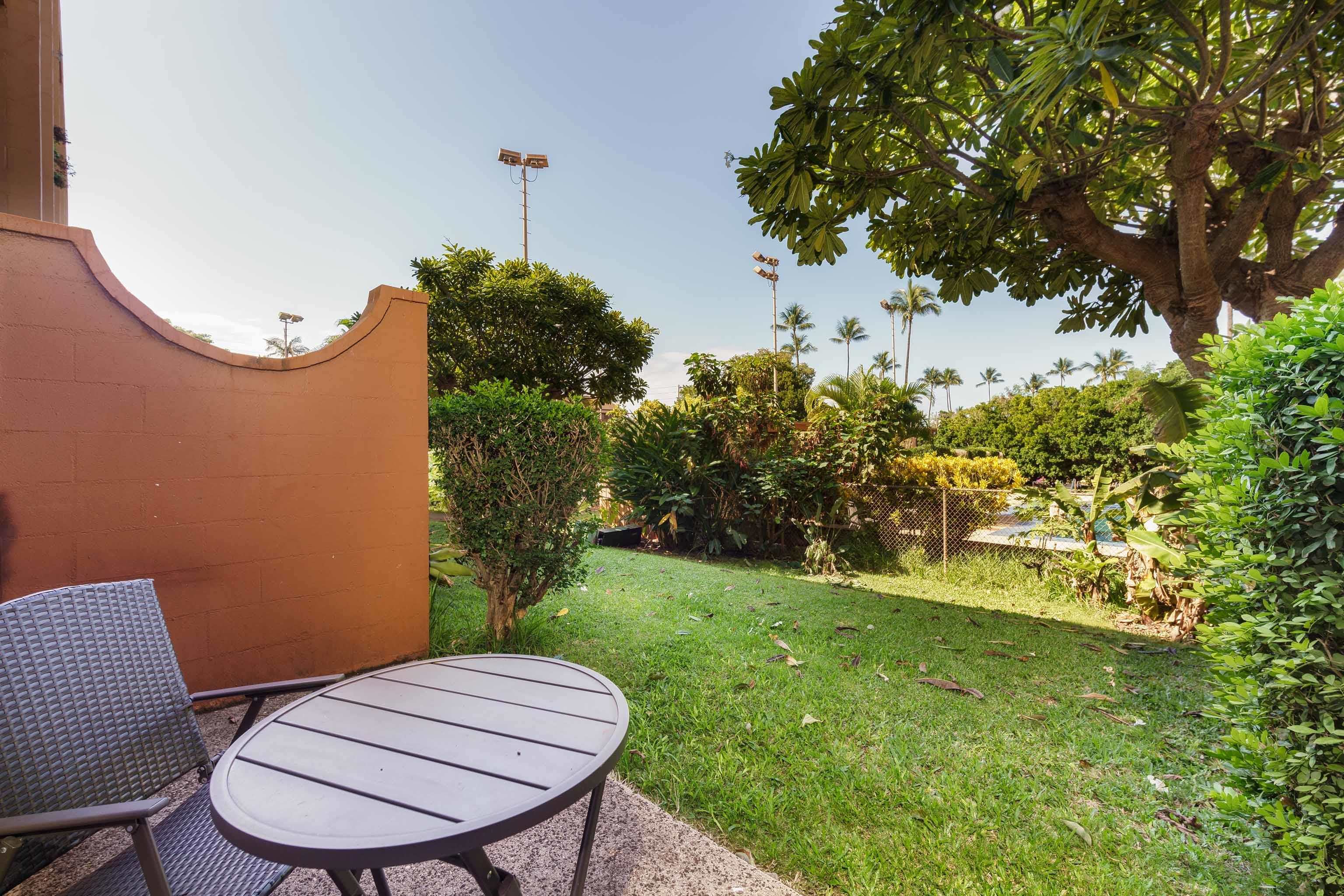 3660 Lower Honoapiilani Road, Unit 111 Lahaina, HI 96761 - Photo 19 of 28 a view of a backyard with plants