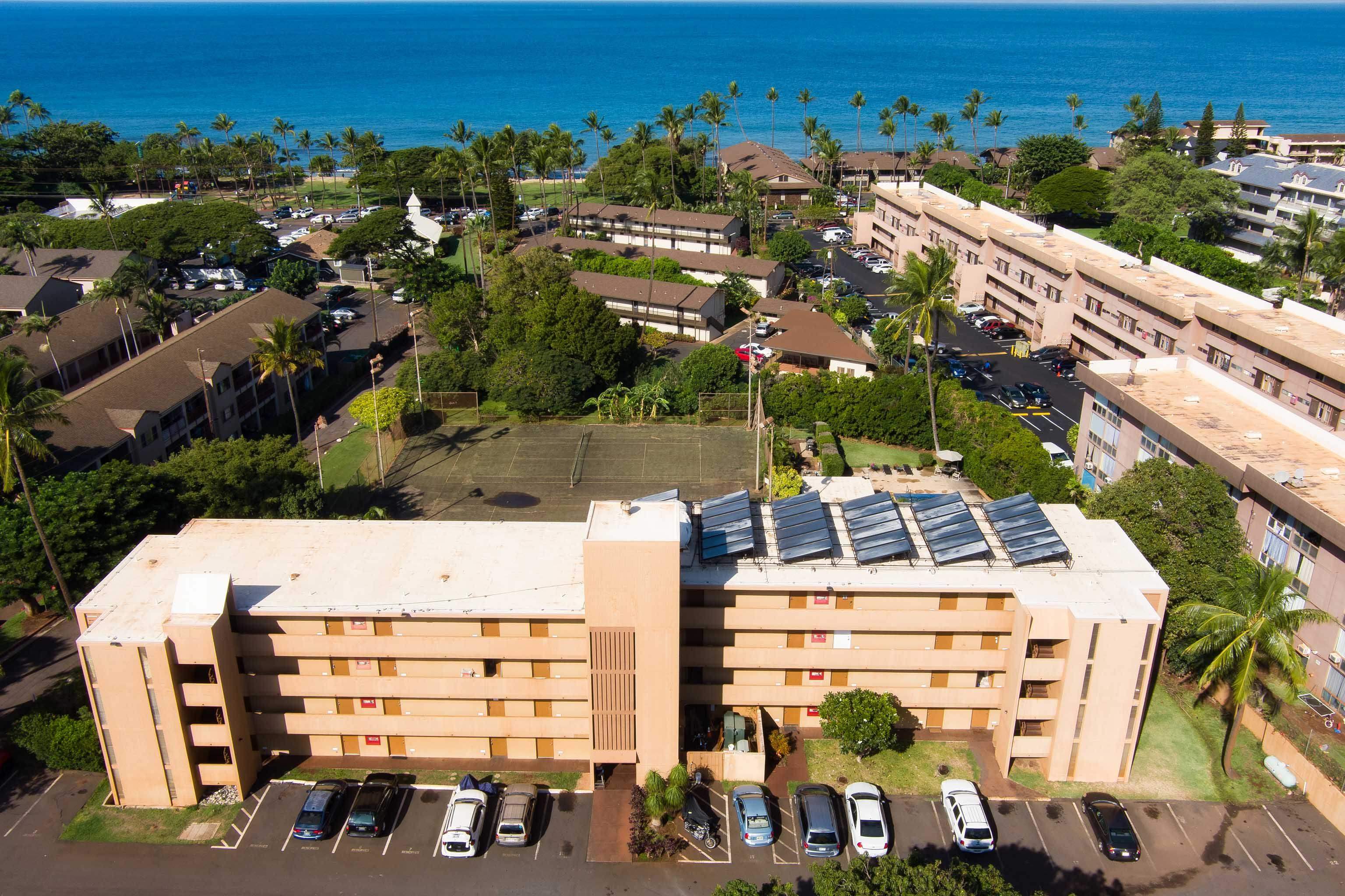 3660 Lower Honoapiilani Road, Unit 111 Lahaina, HI 96761 - Photo 23 of 28 an aerial view of multiple house