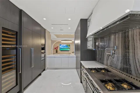 a large spacious bathroom with a large tub shower and sink