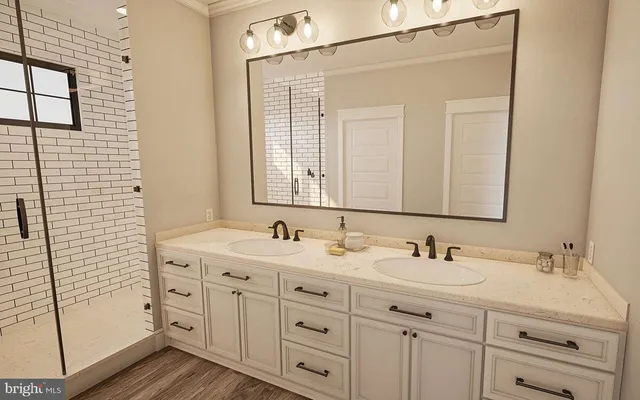 a bathroom with double sink and a mirror