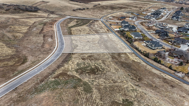 2116 South Valley View Drive, Unit 58 Mapleton, UT 84664 - Photo 4 of 13 Aerial overview of property's location with nearby suburban area