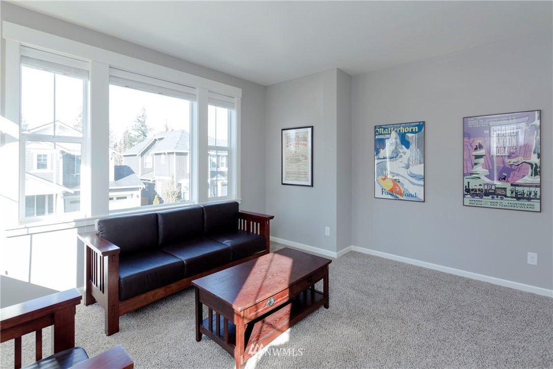 762 Lyons Avenue Northeast Renton, WA 98059 - Photo 15 of 33 a living room with furniture and a window