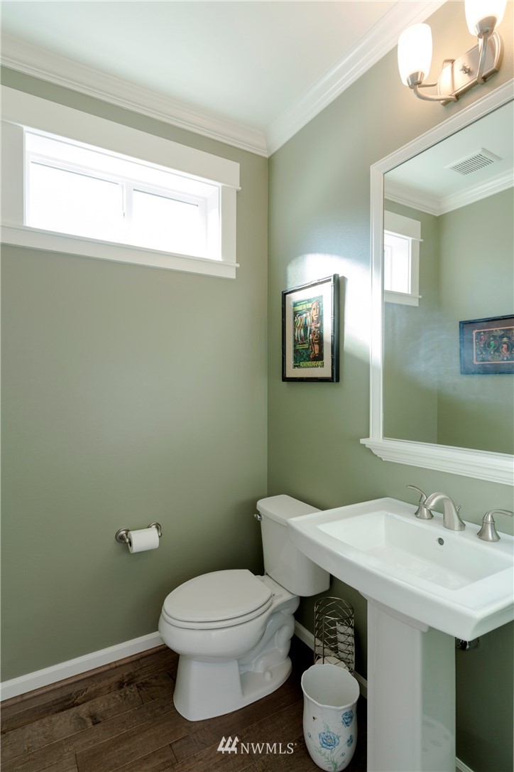 762 Lyons Avenue Northeast Renton, WA 98059 - Photo 16 of 33 a bathroom with a sink toilet and mirror