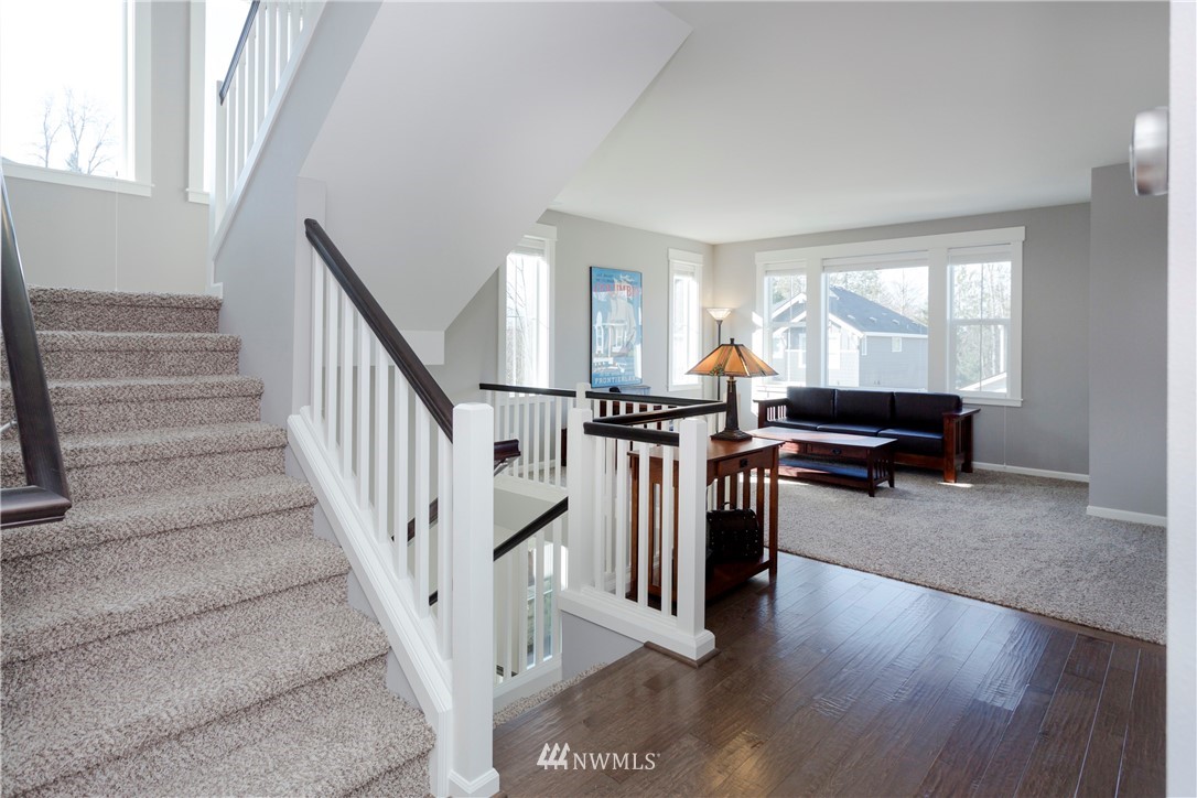 762 Lyons Avenue Northeast Renton, WA 98059 - Photo 17 of 33 a view of a livingroom with furniture and staircase