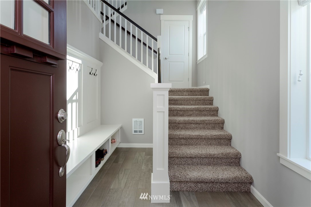 762 Lyons Avenue Northeast Renton, WA 98059 - Photo 3 of 33 a view of entryway and hall with wooden floor
