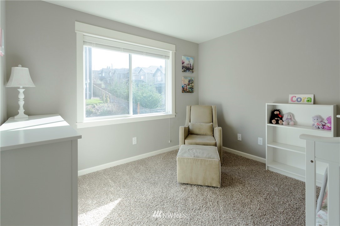 762 Lyons Avenue Northeast Renton, WA 98059 - Photo 23 of 33 a room with a window and gym equipment